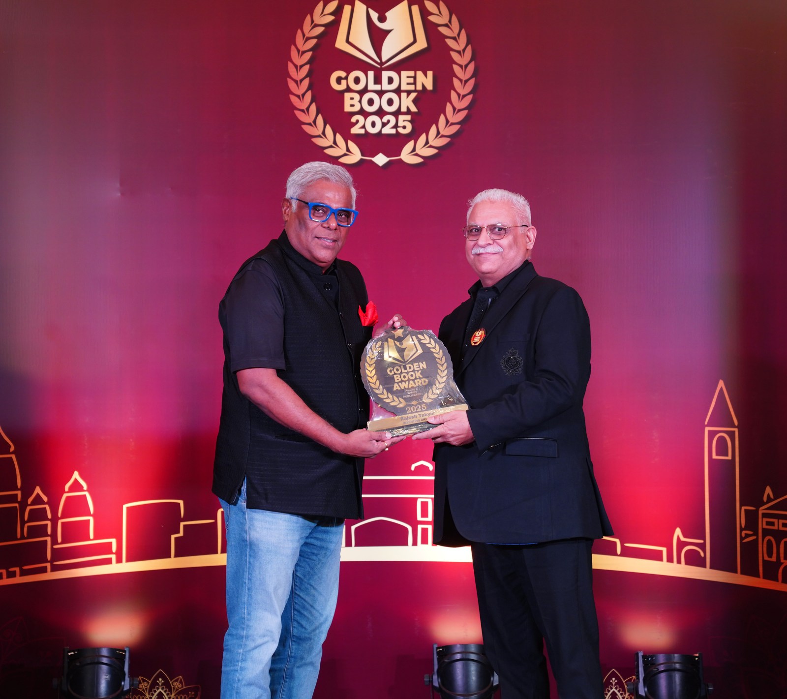 Dr. Rajesh Takyar receiving the Golden Book Awards 2025 honour.